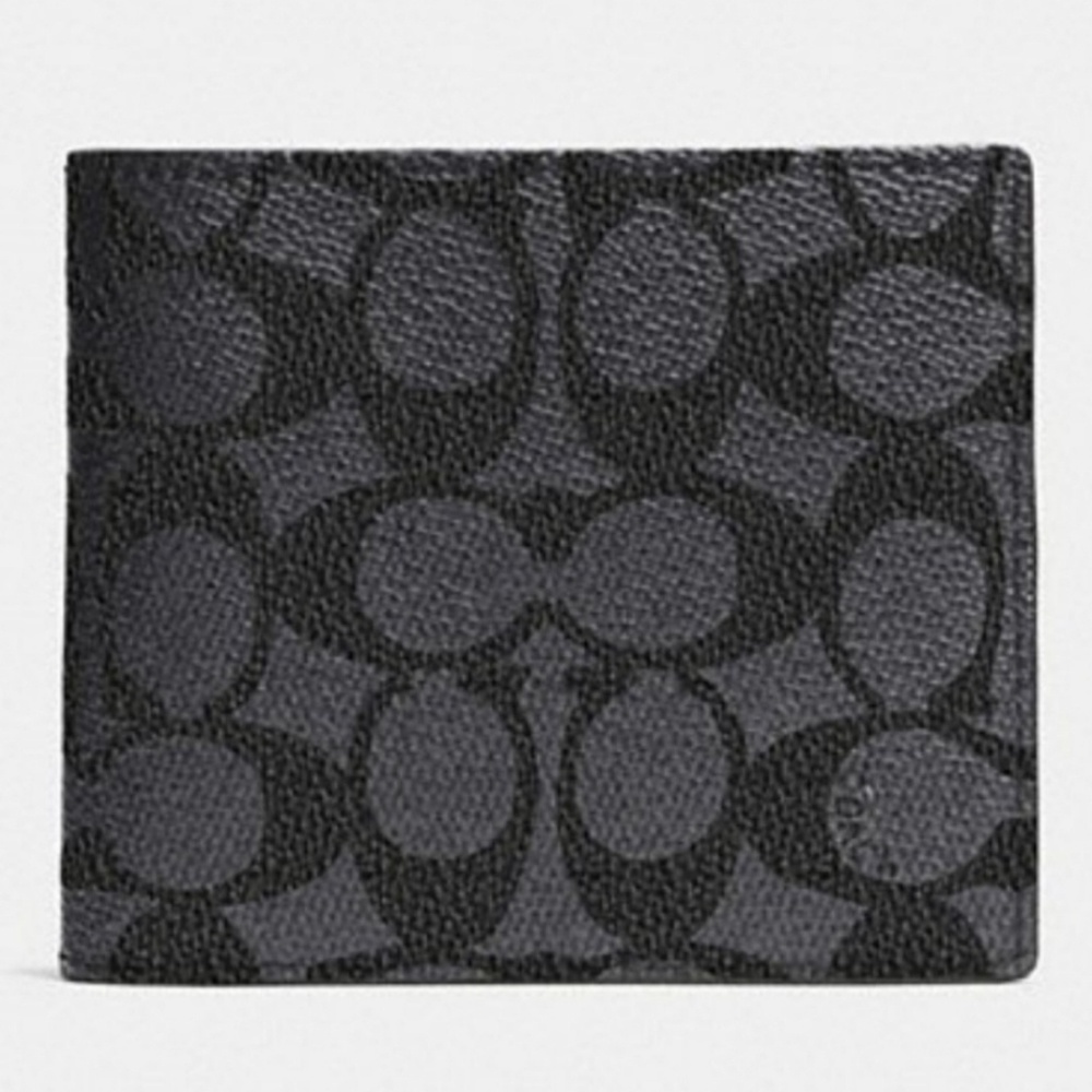 Coach compact ID wallet in signature canvas.